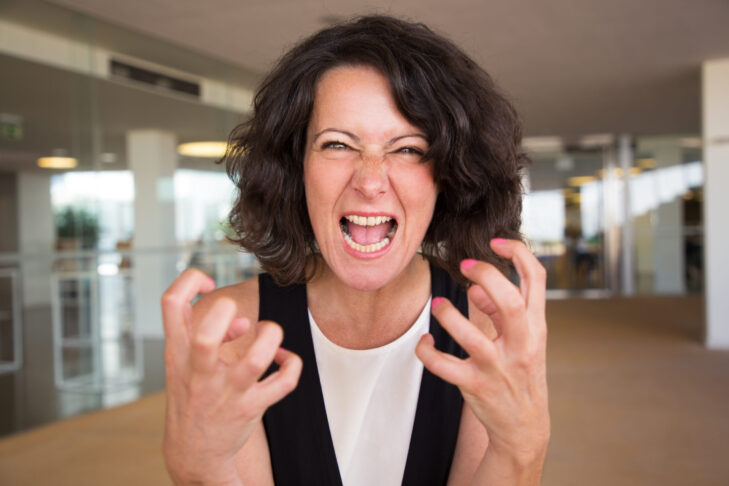 crazy furious woman shouting camera scaled