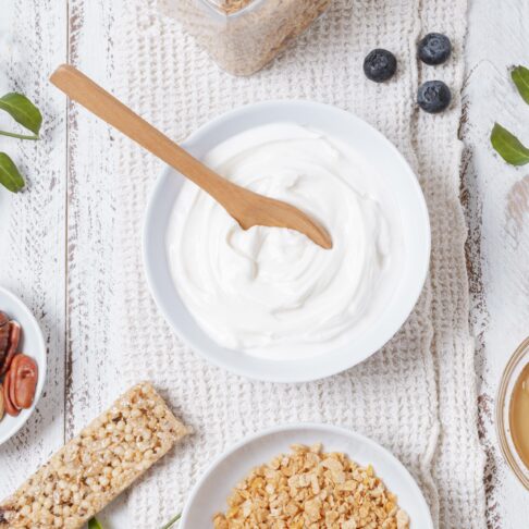 organic yogurt bowl with oats table scaled e1761167000337